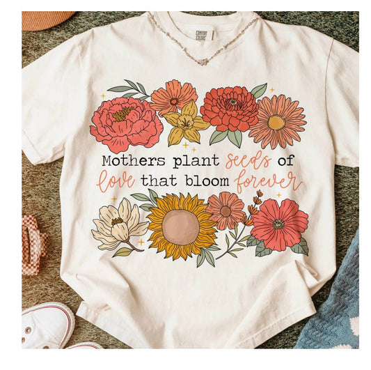 Mothers plant seeds on Comfort color